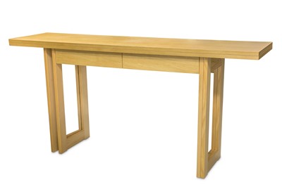 Lot 490a - A Heals light oak console or dining table, the...