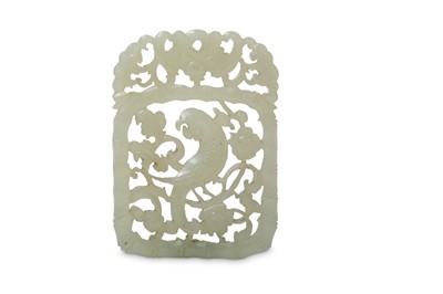 Lot 452 - A CHINESE PALE CELADON JADE RETICULATED...
