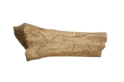 Lot 52 - A CARVED BONE  Circa 1st Millennium B.C....