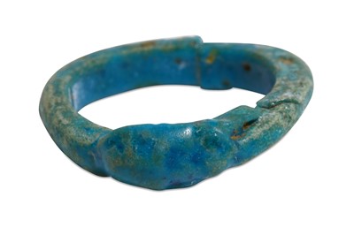 Lot 14 - AN EGYPTIAN GLAZED COMPOSITION RING Circa 1st...