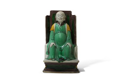 Lot 141 - A CHINESE SANCAI-GLAZED BISCUIT FIGURE OF...