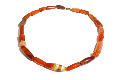 Lot 54 - A NEAR EASTERN CARNELIAN NECKLACE Circa 1st...