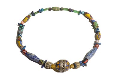 Lot 56 - A BEADED NECKLACE Restrung, formed of several...