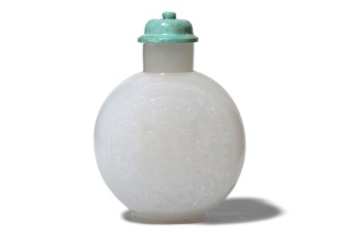 Lot 281 - A CHINESE ‘SILVER DOLLAR’ GLASS SNUFF BOTTLE....