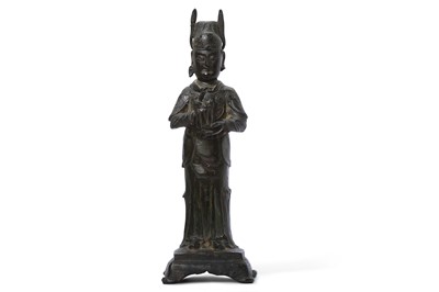 Lot 115 - A CHINESE BRONZE FIGURE OF A DIGNITARY. Ming...