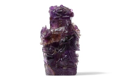 Lot 421 - A CHINESE AMETHYST 'GUANYIN' VASE AND COVER....