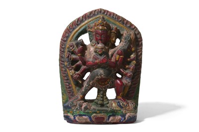 Lot 132 - A TIBETAN POLYCHROMED SANDSTONE FIGURE OF...
