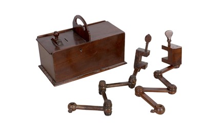 Lot 992 - A 19th century yew candle holder, the block...