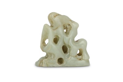 Lot 442 - A CHINESE PALE CELADON JADE CARVING OF A...
