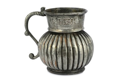 Lot 93 - A TINNED COPPER JUG