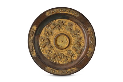 Lot 98 - A CHINESE TONKIN PARCEL-GILT BRONZE CUP STAND....