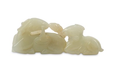 Lot 453 - A CHINESE PALE CELADON JADE CARVING OF A RAM...