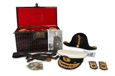Lot 176 - A Royal Navy set of epaulettes, cap and tin,...