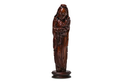 Lot 117 - A CHINESE IVORY FIGURE OF GUANYIN WITH CHILD....