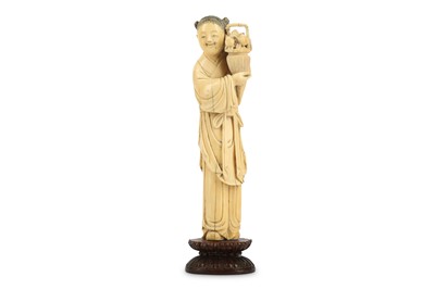 Lot 118 - A CHINESE IVORY FIGURE OF MAGU. Qing Dynasty,...