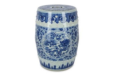 Lot 399 - A CHINESE BLUE AND WHITE BARREL-SHAPED GARDEN...