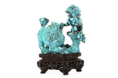 Lot 428 - A CHINESE TURQUOISE ‘LION DOGS’ CARVING. Late...