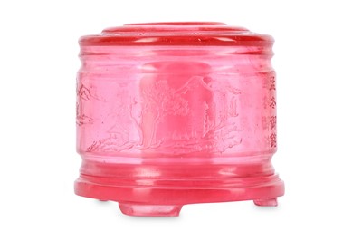 Lot 471 - A CHINESE PINK GLASS ARCHER'S RING HOLDER AND...