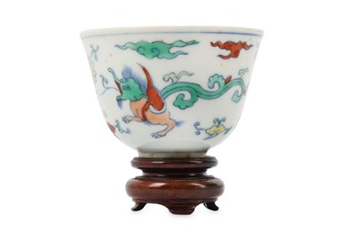 Lot 67 - A CHINESE DOUCAI 'DRAGON' CUP. The deep body...
