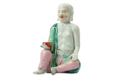 Lot 138 - A CHINESE FAMILLE ROSE FIGURE OF A LUOHAN....