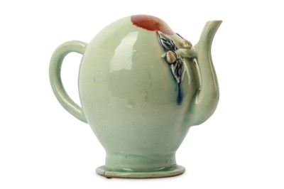 Lot 346 - A CHINESE CELADON-GLAZED CADOGAN 'PEACH'...