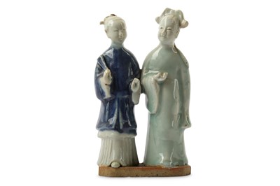 Lot 123 - A CHINESE 'LADY AND MAN' BISCUIT GROUP. Qing...