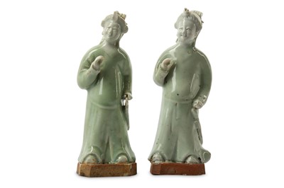 Lot 124 - TWO CHINESE CELADON-GLAZED FIGURES OF LADIES....