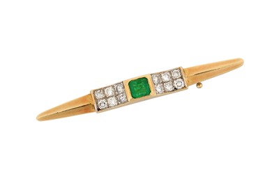 Lot 561 - An emerald and diamond bar brooch Centrally...