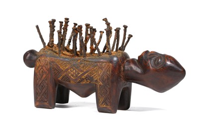 Lot 801 - A WOOD CENSUS Standing on four squat legs,...