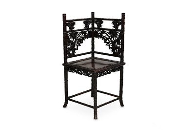 Lot 290 - A CHINESE HONGMU CORNER CHAIR. 19th / 20th...