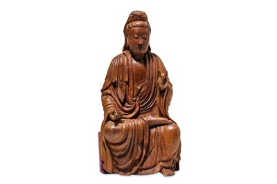 Lot 139 - A CHINESE NANMU FIGURE OF GUANYIN. Ming...