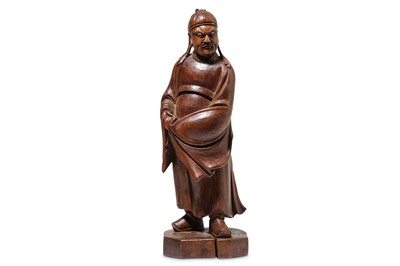 Lot 113 - A CHINESE HARDWOOD FIGURE OF AN OFFICIAL. Late...