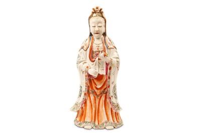 Lot 125 - A CHINESE FAMILLE ROSE MODEL OF GUANYIN. Qing...