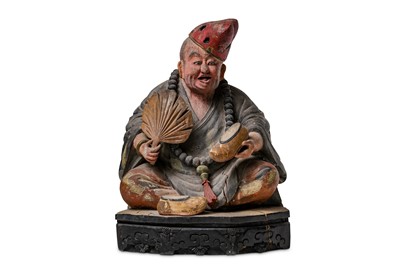 Lot 126 - A CHINESE POLYCHROMED WOOD FIGURE OF JI GONG....
