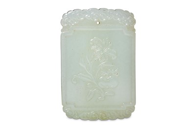 Lot 437 - A CHINESE WHITE JADE 'FLOWER' PLAQUE. Carved...
