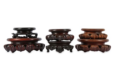 Lot 241 - SIX CHINESE HONGMU WOOD STANDS. Qing Dynasty,...