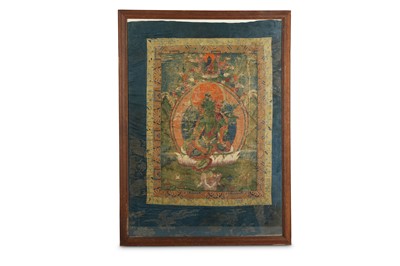 Lot 134 - A THANGKA PAINTING DEPICTING GREEN TARA. Tibet,...