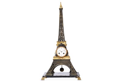 Lot 90 - A GIILT AND PATINATED BRONZE NOVELTY EIFFEL...