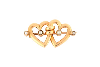 Lot 125 - A double-heart brooch, set with seed pearls,...