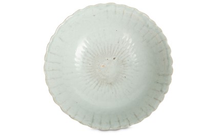 Lot 579 - A CHINESE CELADON-GLAZED BOWL. Ming Dynasty....