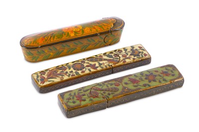Lot 232 - THREE LACQUERED PAPIER-MÂCHÉ CASES Deccan,...
