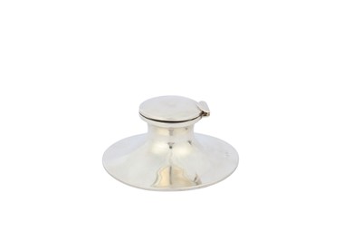 Lot 136 - An Edwardian sterling silver capstan inkwell,...