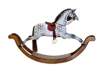 Lot 207 - A 20th Century dapple grey rocking horse, hand...