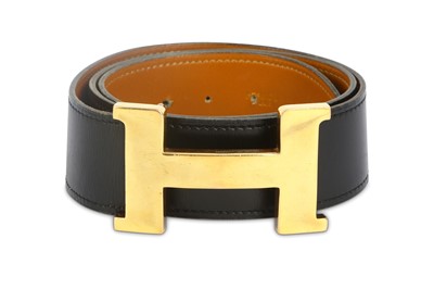 Lot 711 - Hermes Black Box Constance Belt, c. 1972, gilt...