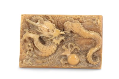 Lot 191 - AN IVORY RECTANGULAR 'DRAGON' PLAQUE. 18th /...