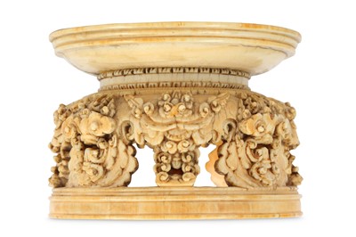 Lot 326 - A TIBETAN IVORY STAND. Tibet, 17th/18th...