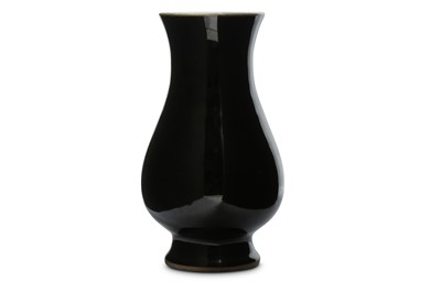 Lot 758 - A CHINESE MIRROR BLACK-GLAZED VASE. Qing...