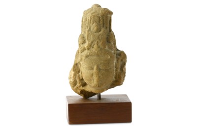 Lot 209 - A BUFF SANDSTONE HEAD OF A DEITY