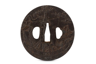 Lot 1013 - AN IRON NAMBAN TSUBA. Edo period. A circular...