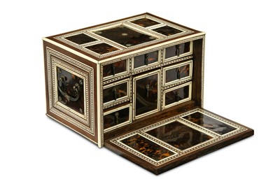 Lot 231 - λ A WOODEN INDO-PORTUGUESE TORTOISESHELL AND IVORY-INLAID CABINET